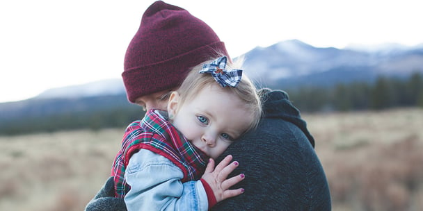 child hugging parent