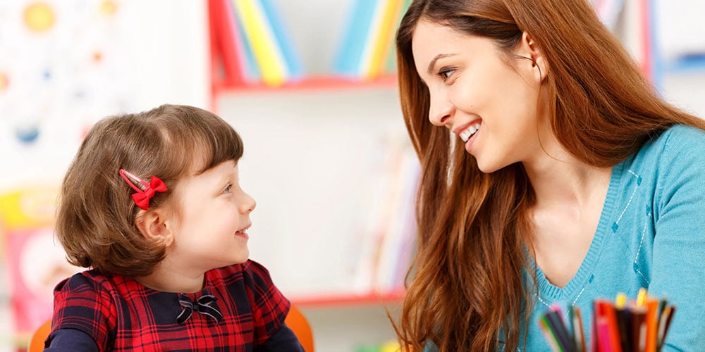 woman talking with child