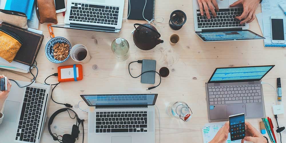 computers on a desk for it course