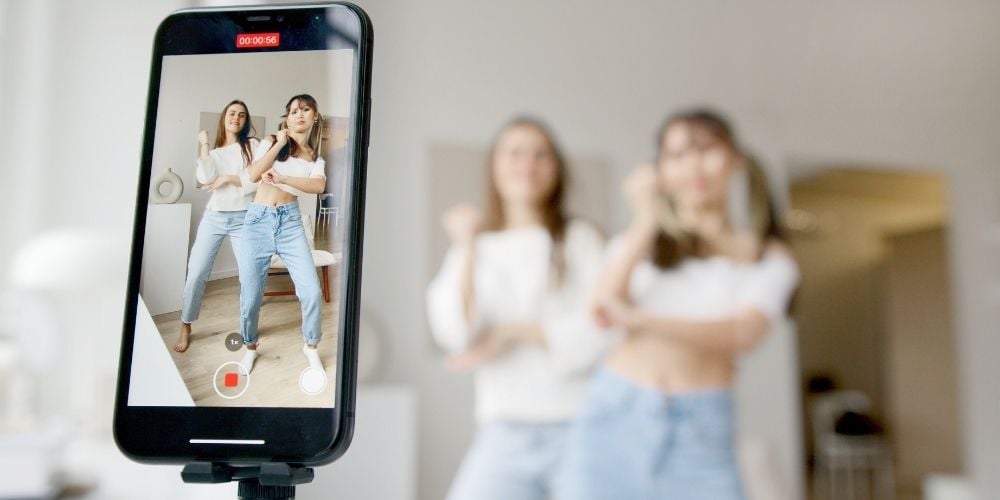 girls dancing tiktok dance video phone
