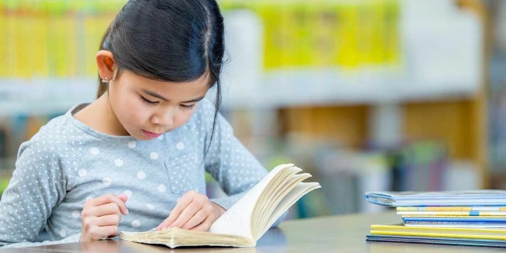 girl reading a book