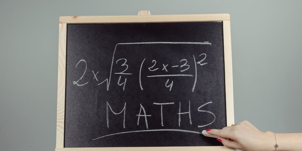 maths question written on a board