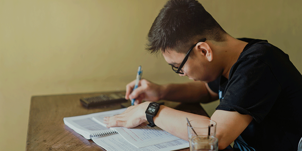 boy studying for university