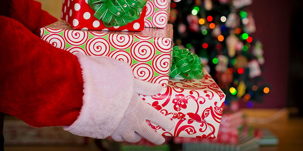 Santa-gifts-hands-christmas