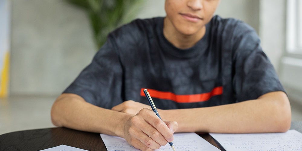 boy studying for a levels