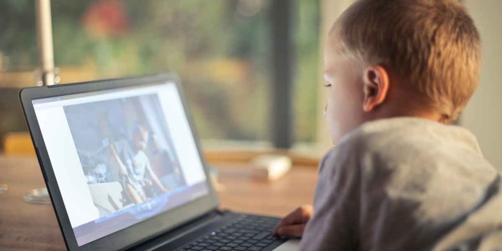 kid on computer