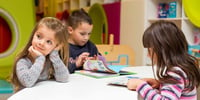 children reading in class