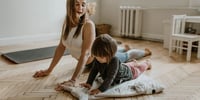 mother and child practicing yoga