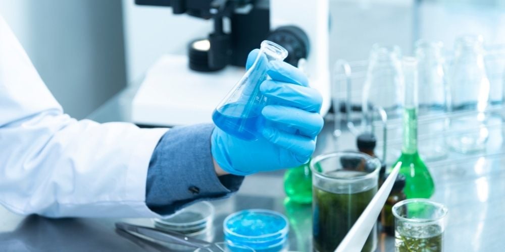 scientist holding a test tube