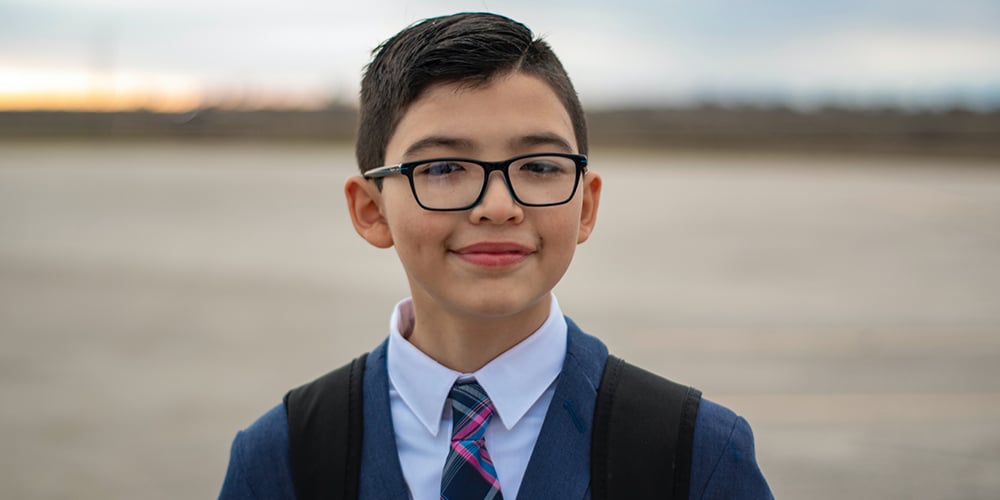 boy in grammar school uniform