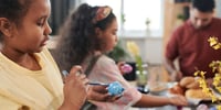 kids painting easter eggs