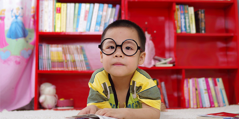 kid_reading_with_glasses