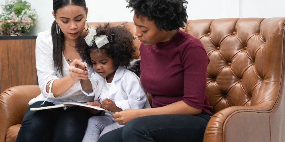 mums reading to child