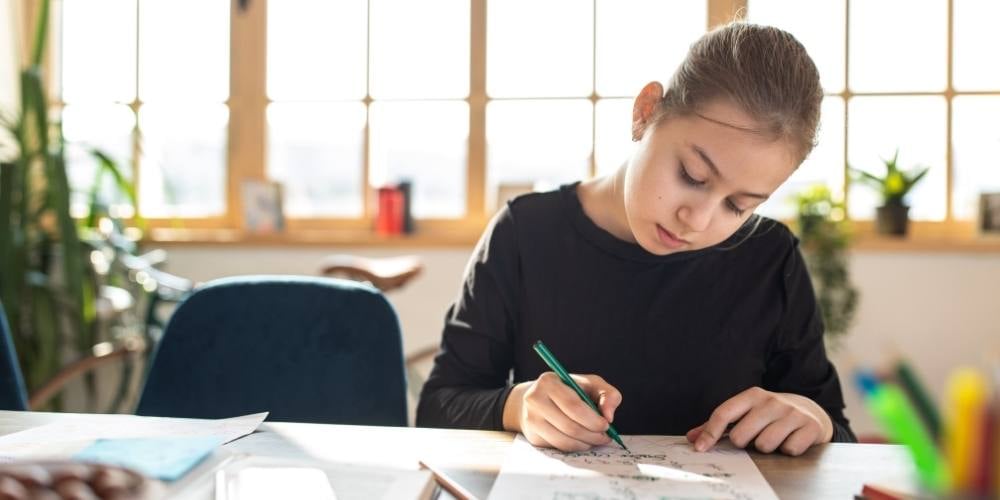 child studying for CSSE exam