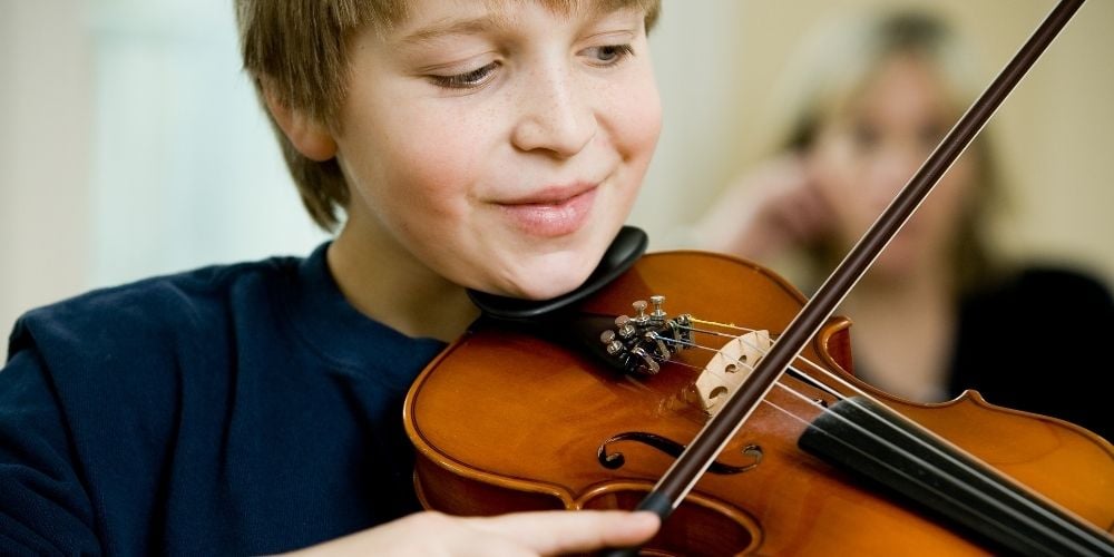 boy playing violin
