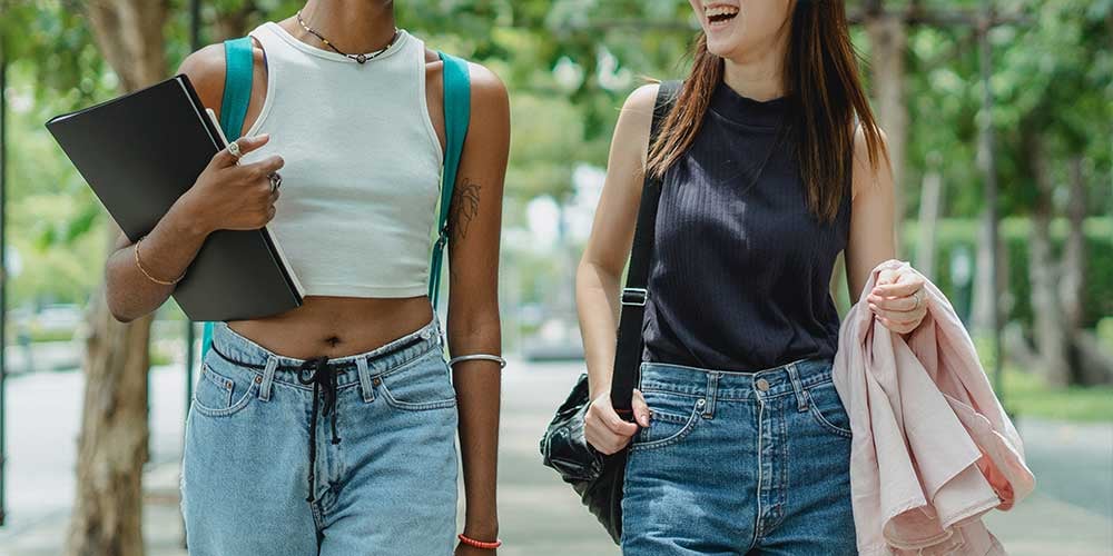 students walking at university