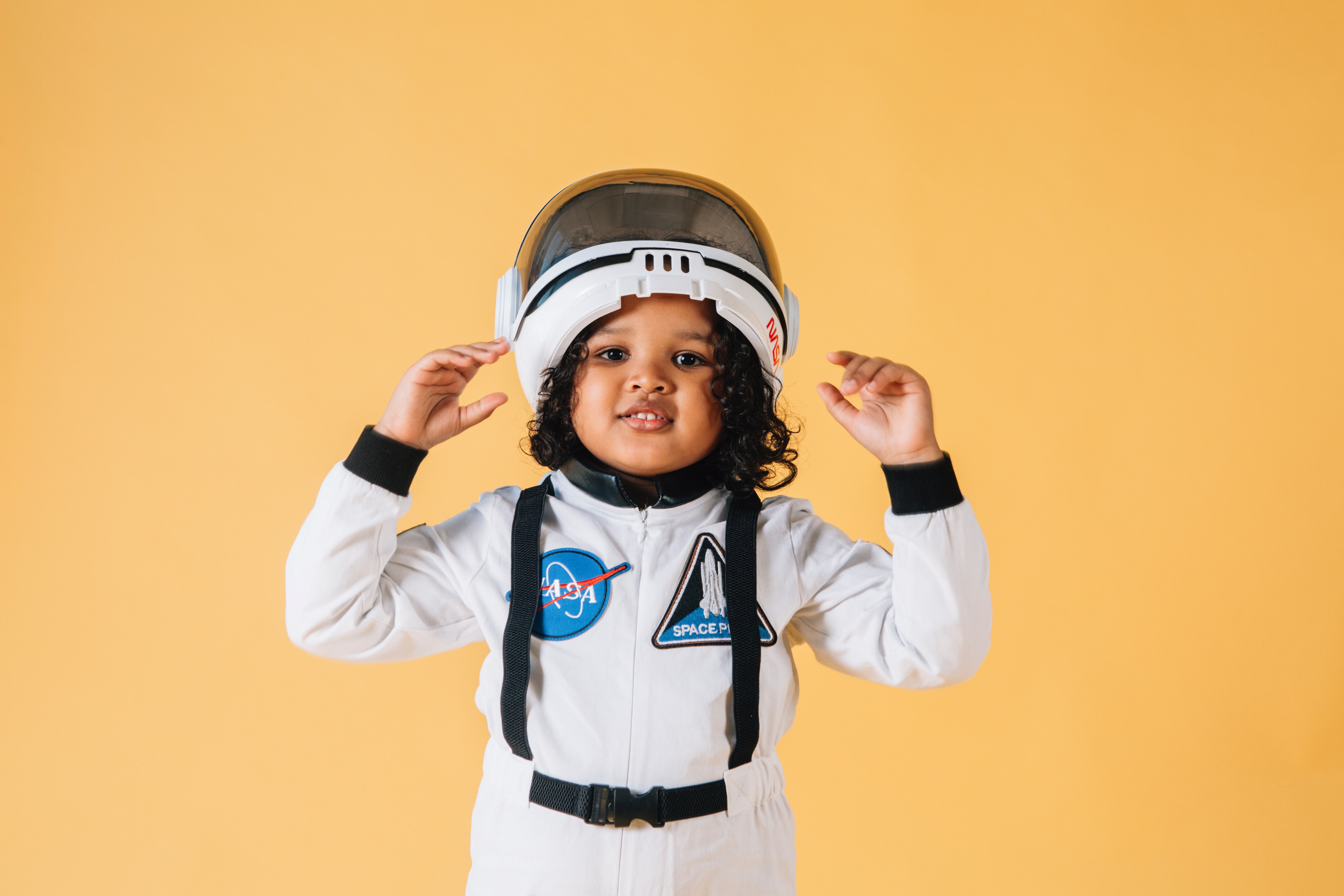young girl dressed up as an astronaut
